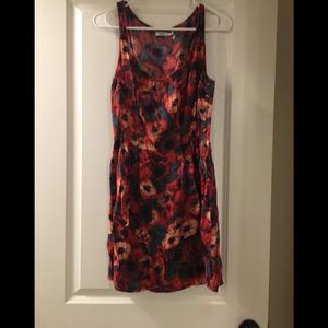 Sleeveless Kimchi blue dress with side buttons